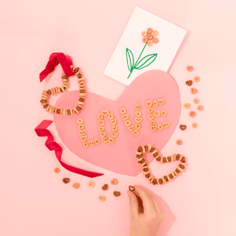 Instagram post featuring heart-shaped Cheerios Kiddos Valentine’s project. - Link to social post